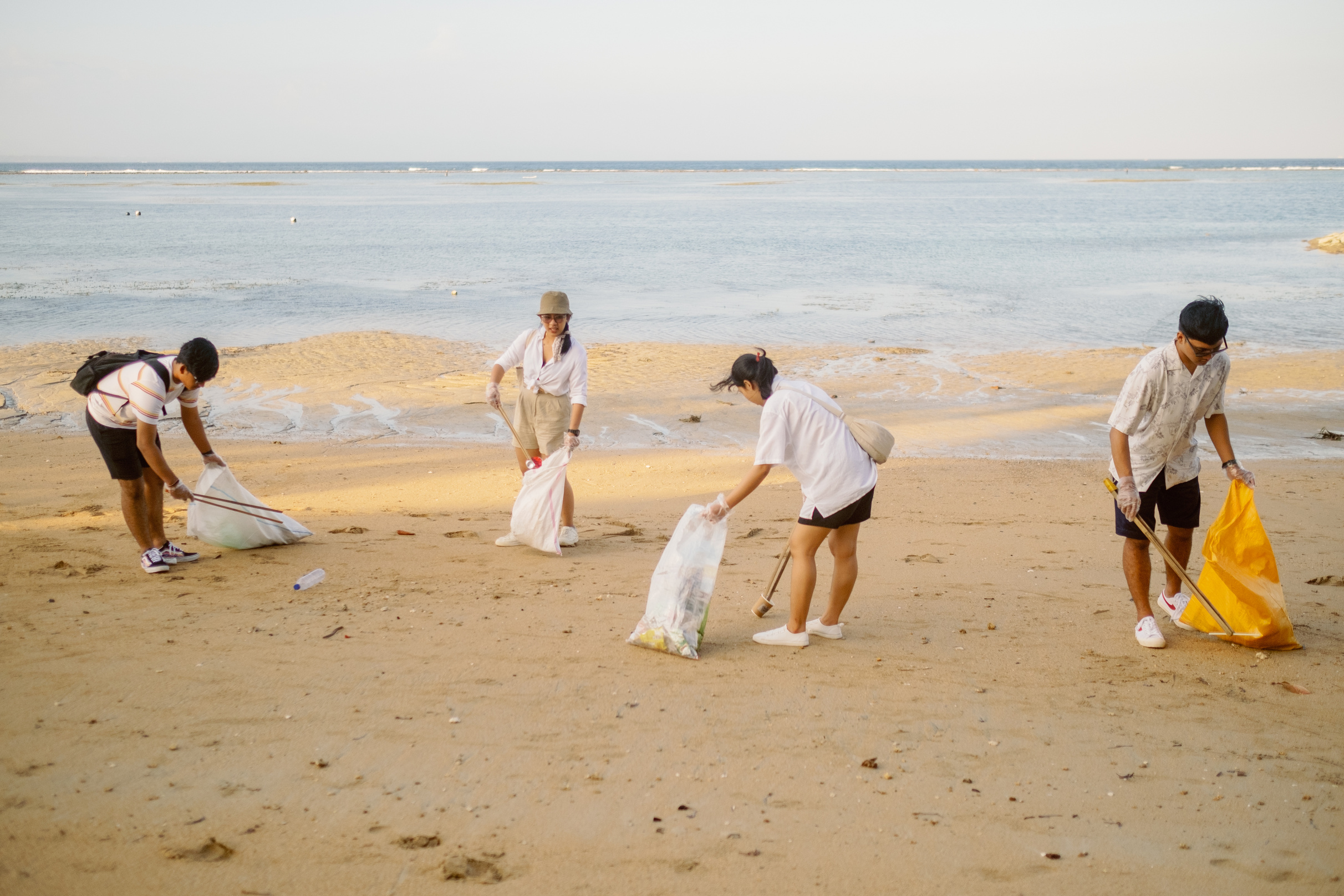 People Cleaning the Trash in Shoreline